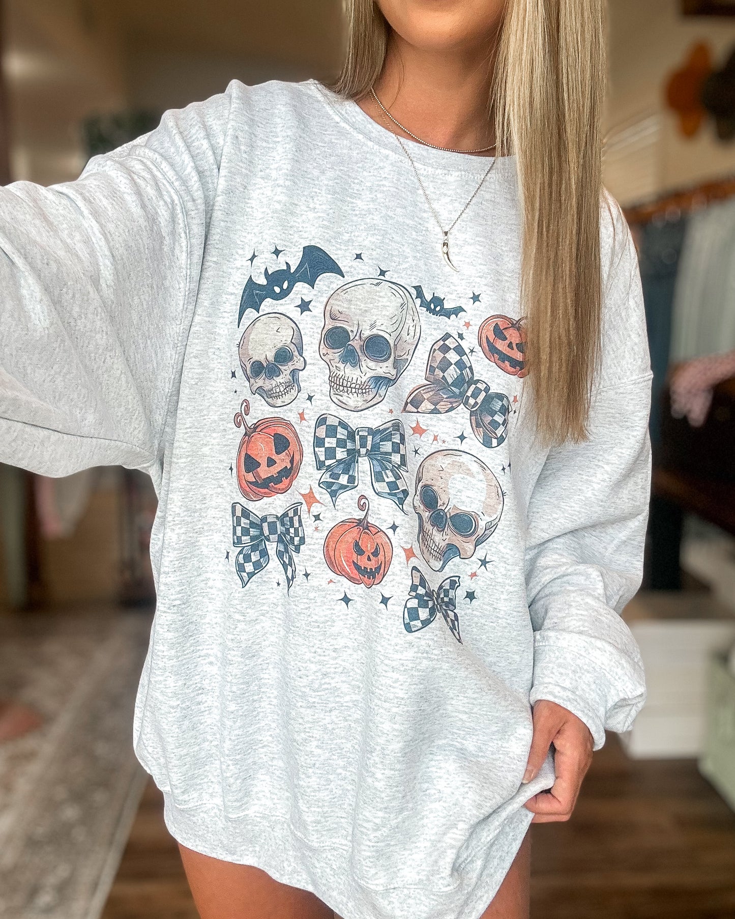 Skull & Bow Collage Sweatshirt